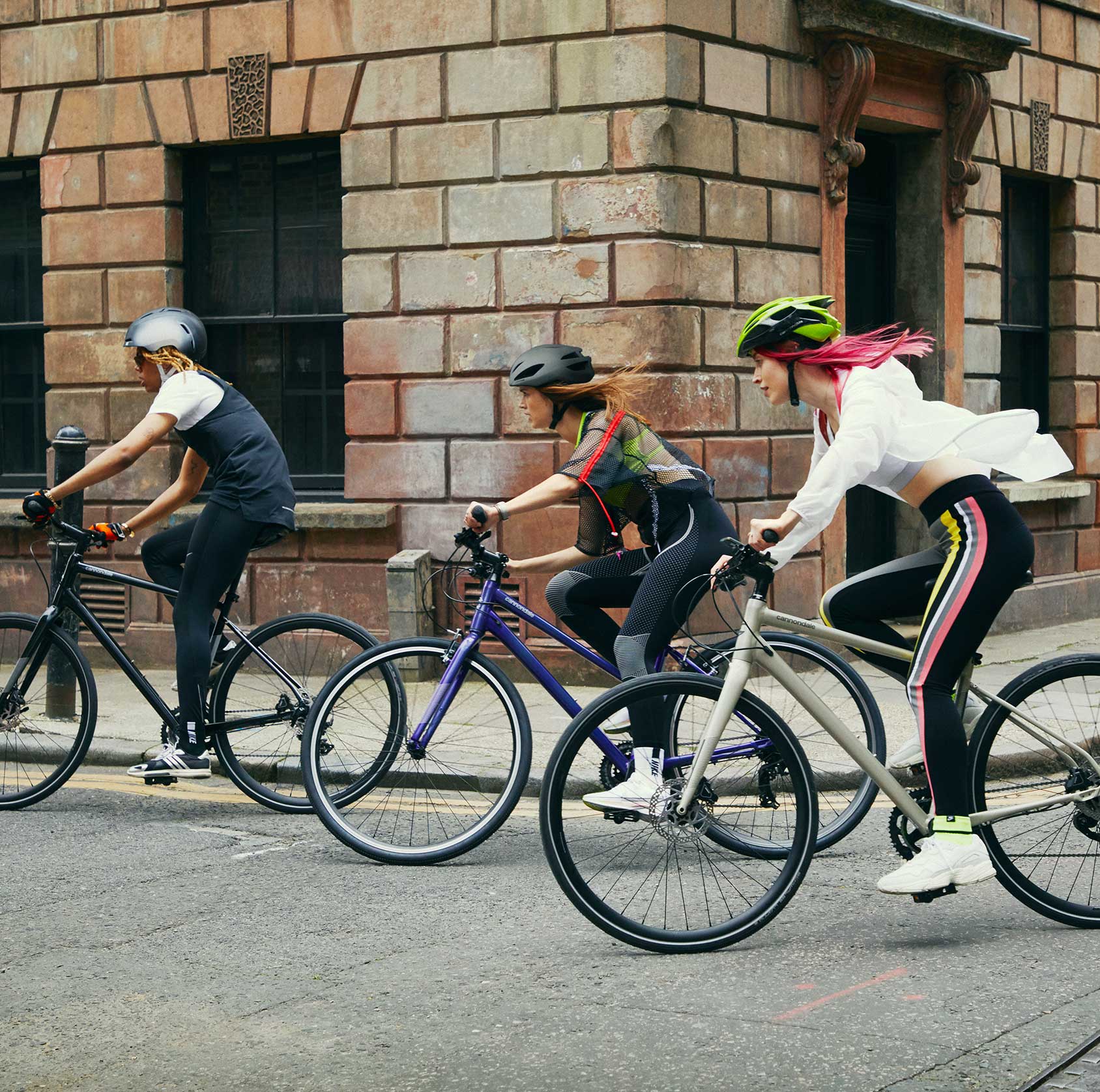 a group of people riding bikes