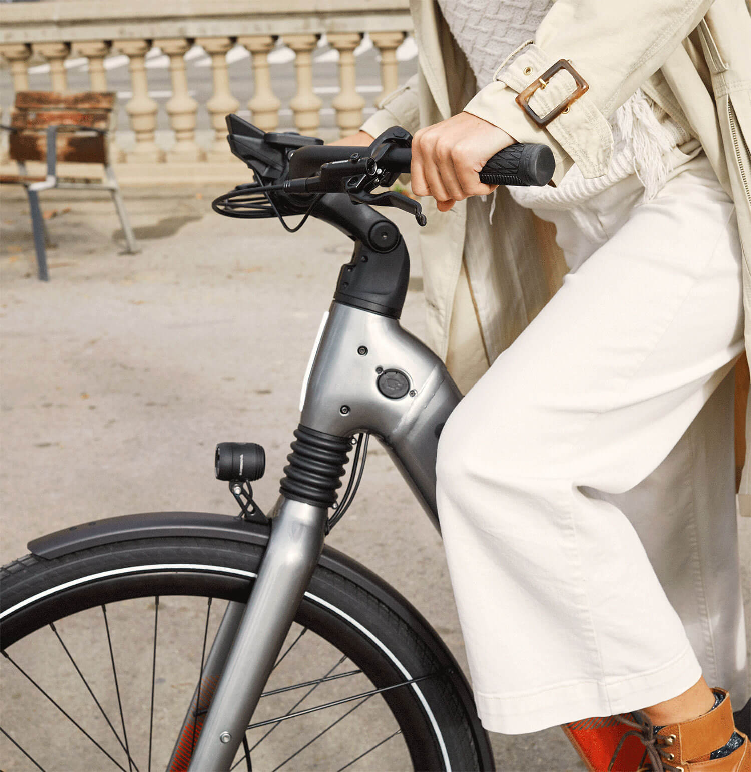 Cannondale Mavaro Neo 5a person in a white suit holding a bike