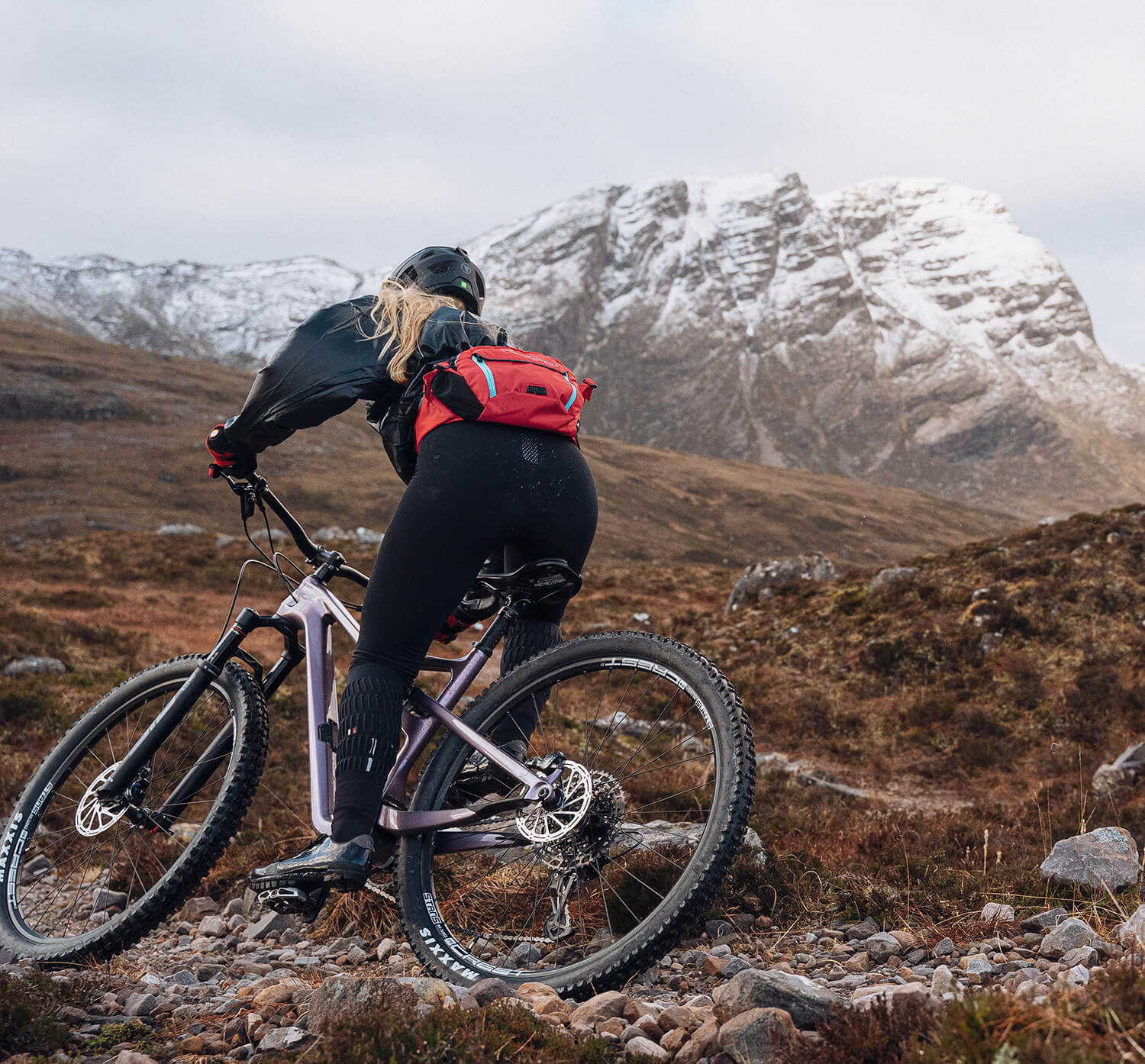 a person riding a bike on a rocky terrain