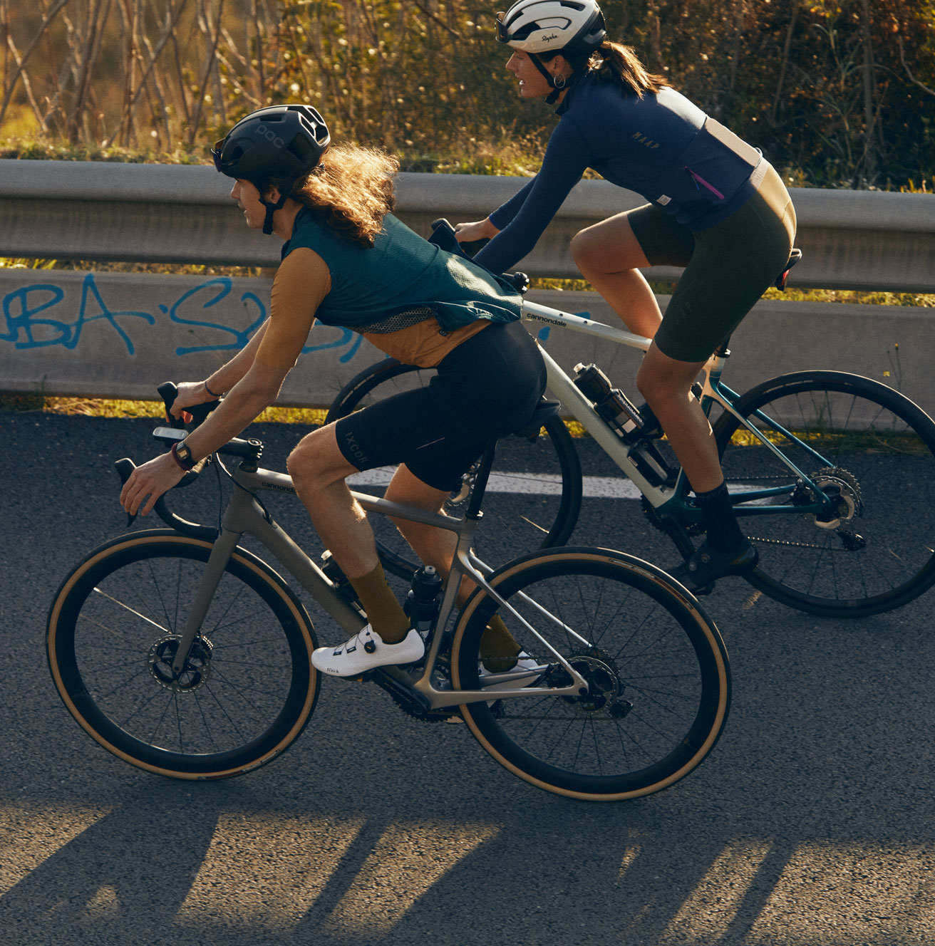 a couple of women riding bikes